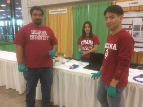Ye group members posing with their presentation materials